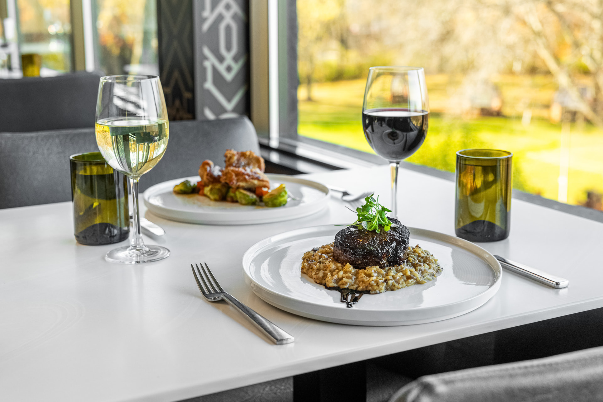 Seared beef with risotto and wine in the Fairchild dining room